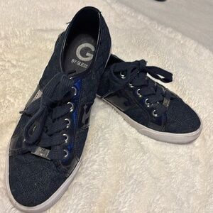 Guess navy blue dress sneakers.